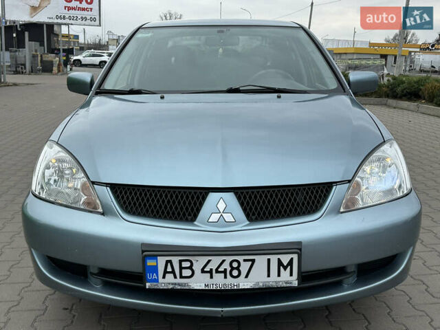 Серый Мицубиси Лансер, объемом двигателя 1.6 л и пробегом 116 тыс. км за 5050 $, фото 1 на Automoto.ua