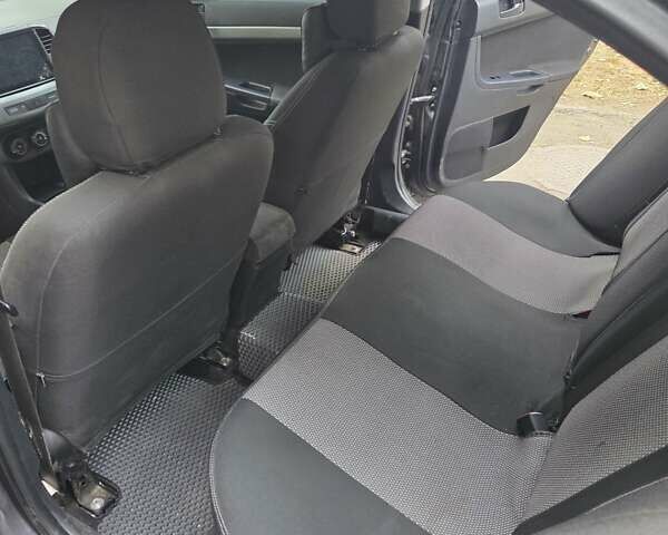 Сірий Міцубісі Lancer, об'ємом двигуна 2 л та пробігом 190 тис. км за 7100 $, фото 2 на Automoto.ua