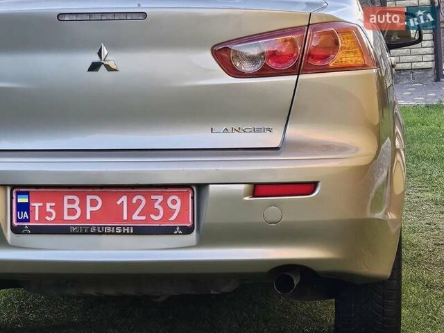 Серый Мицубиси Лансер, объемом двигателя 2 л и пробегом 282 тыс. км за 5450 $, фото 33 на Automoto.ua