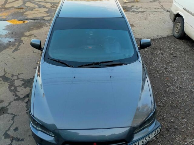 Серый Мицубиси Лансер, объемом двигателя 2 л и пробегом 351 тыс. км за 7000 $, фото 11 на Automoto.ua