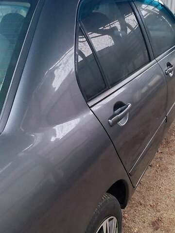 Серый Мицубиси Лансер, объемом двигателя 1.58 л и пробегом 400 тыс. км за 5000 $, фото 5 на Automoto.ua