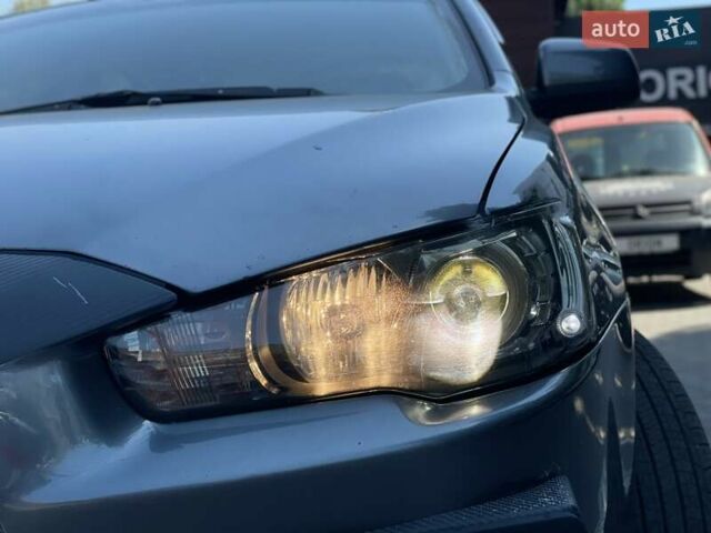 Сірий Міцубісі Lancer, об'ємом двигуна 2 л та пробігом 203 тис. км за 6999 $, фото 10 на Automoto.ua