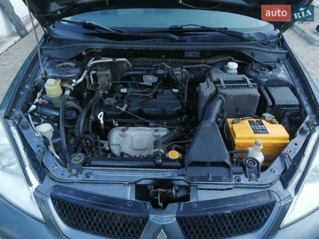Сірий Міцубісі Lancer, об'ємом двигуна 1.6 л та пробігом 122 тис. км за 3500 $, фото 4 на Automoto.ua