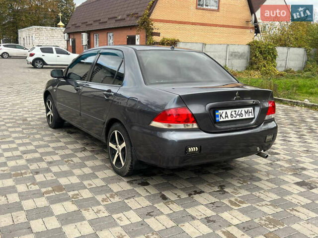 Міцубісі Lancer 2007 у Белой Церкве на Automoto.ua Сірий Міцубісі Lancer, об'ємом двигуна 1.58 л та пробігом 254 тис. км за 3200 $, фото 6 на Automoto.ua