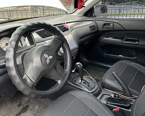 Сірий Міцубісі Lancer, об'ємом двигуна 1.6 л та пробігом 199 тис. км за 4000 $, фото 4 на Automoto.ua