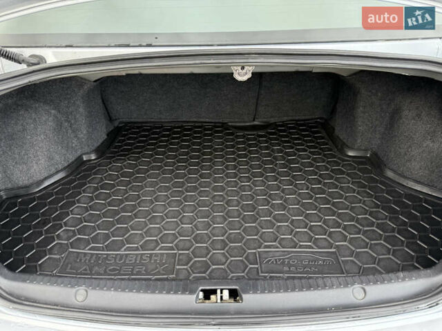 Серый Мицубиси Лансер, объемом двигателя 1.5 л и пробегом 97 тыс. км за 7300 $, фото 25 на Automoto.ua