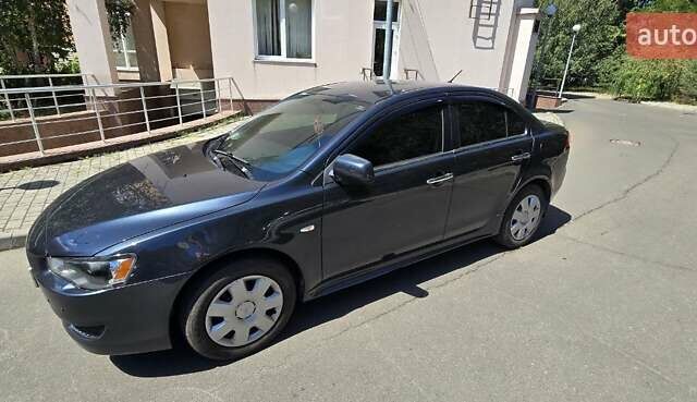 Сірий Міцубісі Lancer, об'ємом двигуна 1.5 л та пробігом 211 тис. км за 5600 $, фото 1 на Automoto.ua