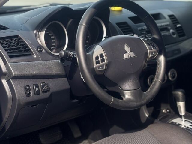 Сірий Міцубісі Lancer, об'ємом двигуна 2 л та пробігом 220 тис. км за 6600 $, фото 5 на Automoto.ua