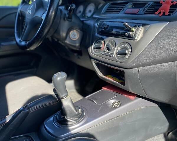 Сірий Міцубісі Lancer, об'ємом двигуна 1.6 л та пробігом 293 тис. км за 5000 $, фото 10 на Automoto.ua
