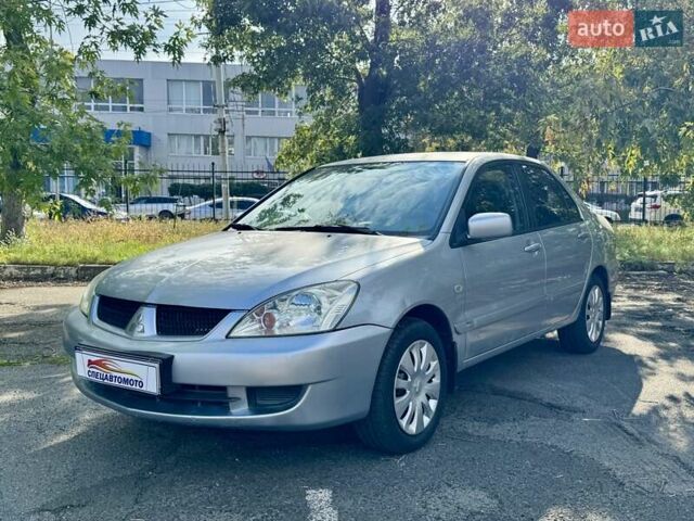 Сірий Міцубісі Lancer, об'ємом двигуна 1.58 л та пробігом 138 тис. км за 4990 $, фото 3 на Automoto.ua
