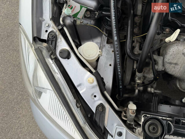 Серый Мицубиси Лансер, объемом двигателя 1.3 л и пробегом 160 тыс. км за 5555 $, фото 76 на Automoto.ua