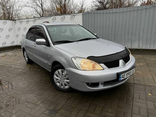 Серый Мицубиси Лансер, объемом двигателя 1.6 л и пробегом 205 тыс. км за 5300 $, фото 1 на Automoto.ua