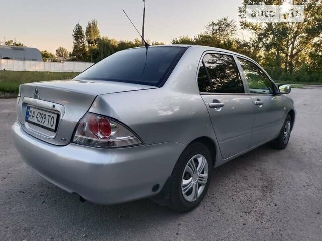 Сірий Міцубісі Lancer, об'ємом двигуна 1.3 л та пробігом 175 тис. км за 4350 $, фото 3 на Automoto.ua