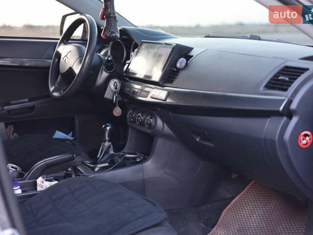 Серый Мицубиси Лансер, объемом двигателя 1.5 л и пробегом 330 тыс. км за 5250 $, фото 4 на Automoto.ua