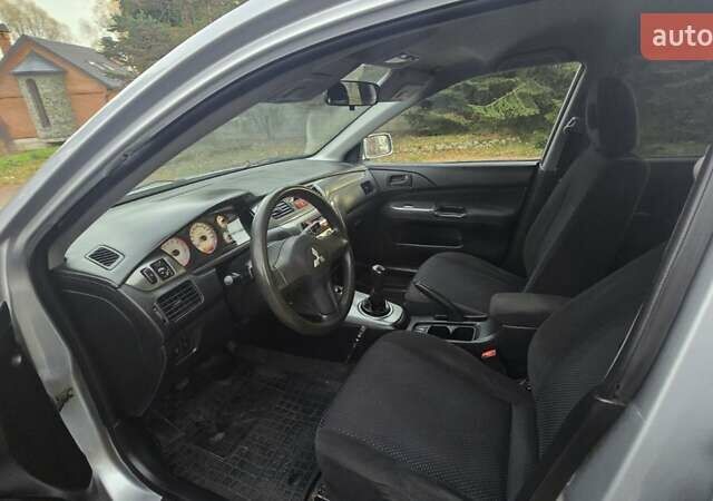 Сірий Міцубісі Lancer, об'ємом двигуна 1.6 л та пробігом 213 тис. км за 3600 $, фото 27 на Automoto.ua
