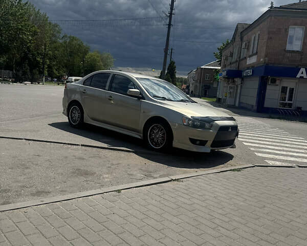 Серый Мицубиси Лансер, объемом двигателя 2 л и пробегом 227 тыс. км за 5850 $, фото 16 на Automoto.ua