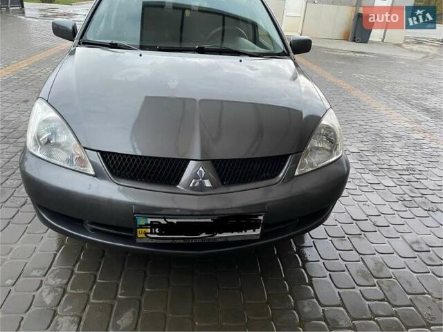 Сірий Міцубісі Lancer, об'ємом двигуна 1.6 л та пробігом 330 тис. км за 3500 $, фото 16 на Automoto.ua