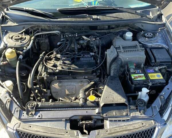 Сірий Міцубісі Lancer, об'ємом двигуна 1.6 л та пробігом 293 тис. км за 5000 $, фото 18 на Automoto.ua