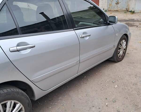 Сірий Міцубісі Lancer, об'ємом двигуна 1.6 л та пробігом 122 тис. км за 5500 $, фото 3 на Automoto.ua
