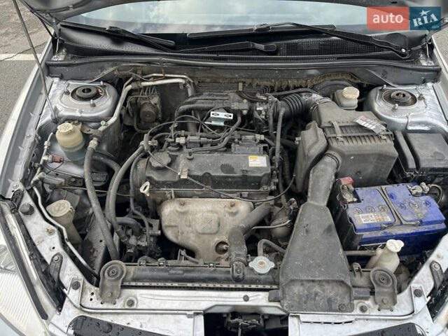 Серый Мицубиси Лансер, объемом двигателя 1.58 л и пробегом 232 тыс. км за 4900 $, фото 28 на Automoto.ua