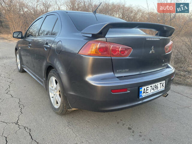 Сірий Міцубісі Lancer, об'ємом двигуна 2 л та пробігом 205 тис. км за 7000 $, фото 5 на Automoto.ua
