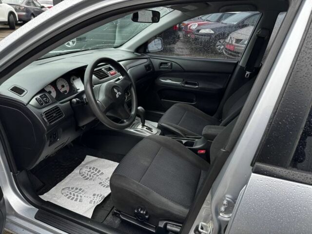 Серый Мицубиси Лансер, объемом двигателя 1.6 л и пробегом 205 тыс. км за 5300 $, фото 7 на Automoto.ua