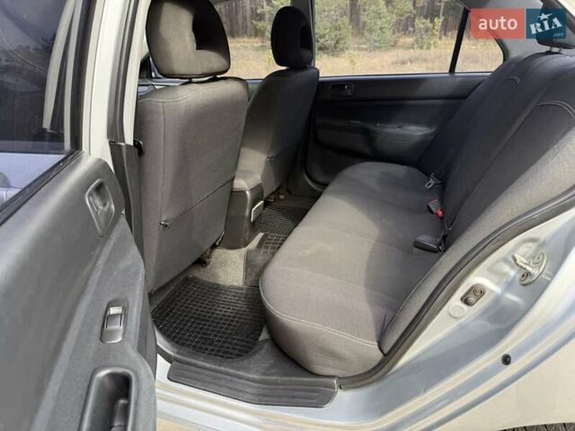 Серый Мицубиси Лансер, объемом двигателя 1.6 л и пробегом 200 тыс. км за 4400 $, фото 17 на Automoto.ua