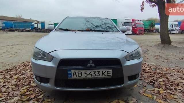 Серый Мицубиси Лансер, объемом двигателя 2 л и пробегом 305 тыс. км за 6300 $, фото 9 на Automoto.ua