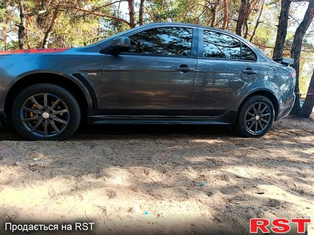 Серый Мицубиси Лансер, объемом двигателя 1.5 л и пробегом 220 тыс. км за 5200 $, фото 1 на Automoto.ua