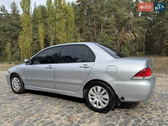 Серый Мицубиси Лансер, объемом двигателя 1.6 л и пробегом 200 тыс. км за 4400 $, фото 11 на Automoto.ua