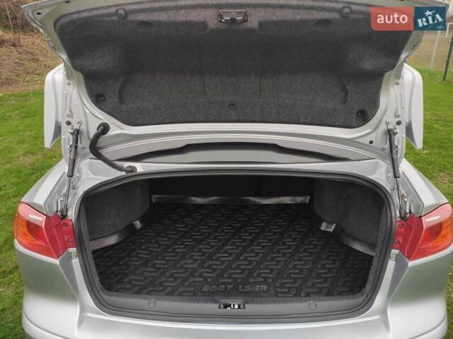 Сірий Міцубісі Lancer, об'ємом двигуна 2 л та пробігом 124 тис. км за 7499 $, фото 16 на Automoto.ua