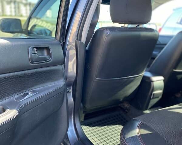 Сірий Міцубісі Lancer, об'ємом двигуна 1.6 л та пробігом 293 тис. км за 5000 $, фото 16 на Automoto.ua