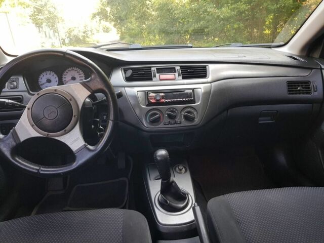 Сірий Міцубісі Lancer, об'ємом двигуна 1.6 л та пробігом 340 тис. км за 3250 $, фото 10 на Automoto.ua