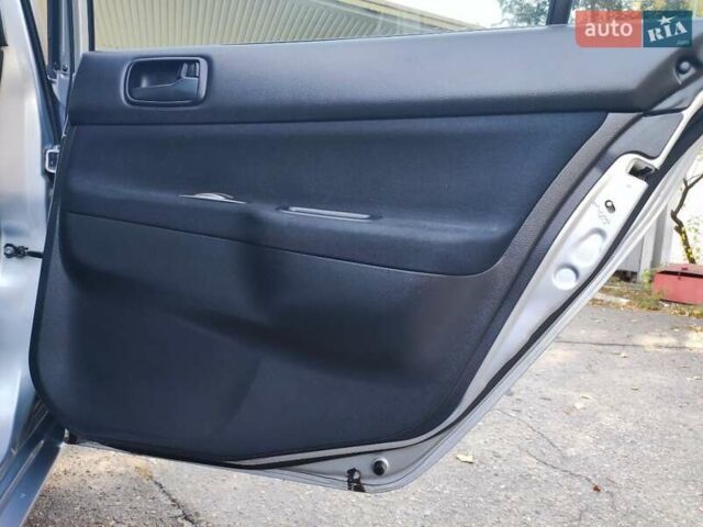 Сірий Міцубісі Lancer, об'ємом двигуна 1.58 л та пробігом 122 тис. км за 6300 $, фото 38 на Automoto.ua