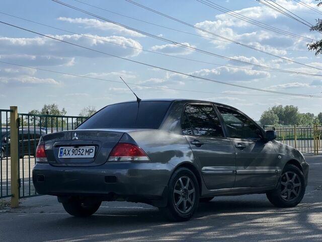 Сірий Міцубісі Lancer, об'ємом двигуна 0.16 л та пробігом 250 тис. км за 4350 $, фото 1 на Automoto.ua