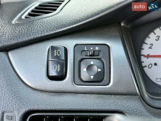 Сірий Міцубісі Lancer, об'ємом двигуна 1.6 л та пробігом 395 тис. км за 4900 $, фото 24 на Automoto.ua