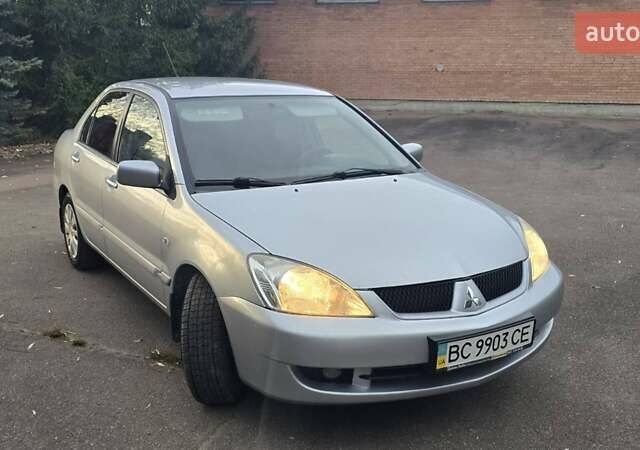 Сірий Міцубісі Lancer, об'ємом двигуна 1.6 л та пробігом 213 тис. км за 3600 $, фото 1 на Automoto.ua
