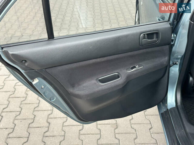 Сірий Міцубісі Lancer, об'ємом двигуна 1.6 л та пробігом 116 тис. км за 5199 $, фото 21 на Automoto.ua