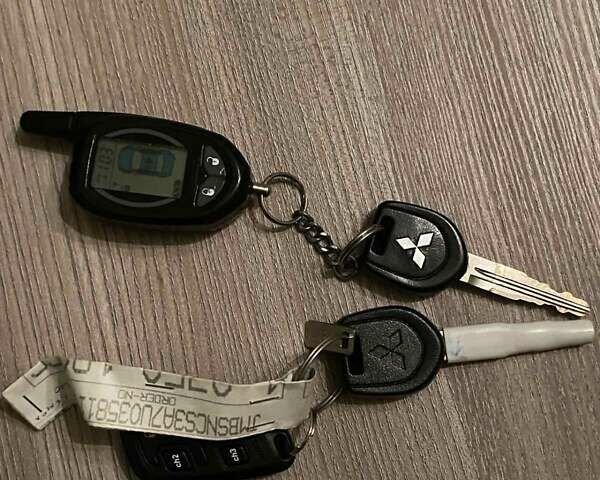 Серый Мицубиси Лансер, объемом двигателя 1.59 л и пробегом 220 тыс. км за 6500 $, фото 8 на Automoto.ua