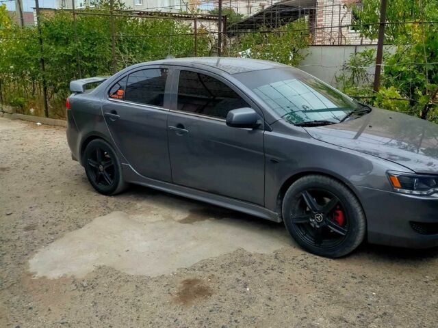 Серый Мицубиси Лансер, объемом двигателя 2 л и пробегом 351 тыс. км за 7000 $, фото 10 на Automoto.ua