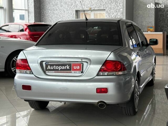 Серый Мицубиси Лансер, объемом двигателя 1.6 л и пробегом 174 тыс. км за 5990 $, фото 4 на Automoto.ua