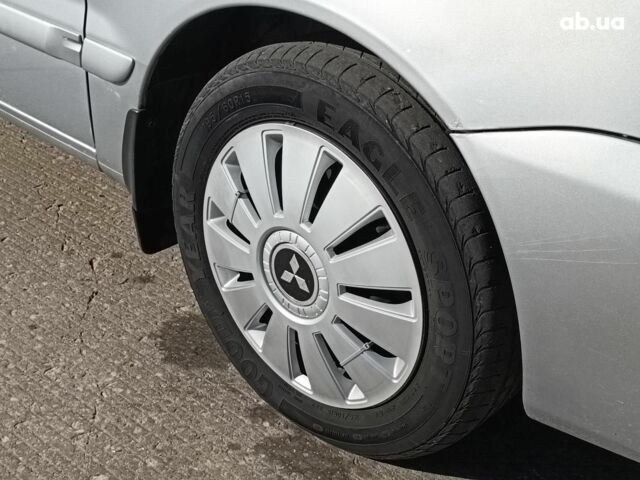 Сірий Міцубісі Lancer, об'ємом двигуна 1.6 л та пробігом 222 тис. км за 3990 $, фото 5 на Automoto.ua