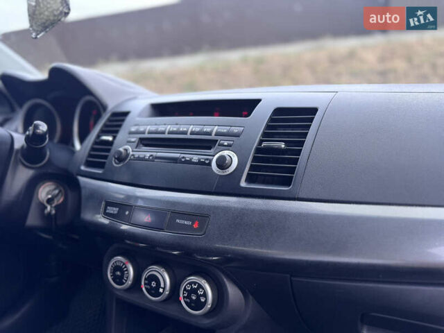 Сірий Міцубісі Lancer, об'ємом двигуна 2 л та пробігом 222 тис. км за 6300 $, фото 20 на Automoto.ua