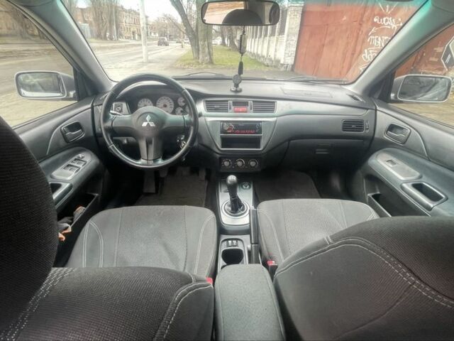 Сірий Міцубісі Lancer, об'ємом двигуна 1.6 л та пробігом 200 тис. км за 4200 $, фото 6 на Automoto.ua