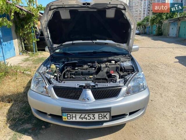 Сірий Міцубісі Lancer, об'ємом двигуна 1.6 л та пробігом 381 тис. км за 3350 $, фото 8 на Automoto.ua