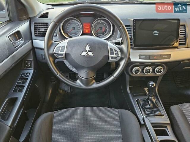 Серый Мицубиси Лансер, объемом двигателя 2 л и пробегом 282 тыс. км за 5450 $, фото 49 на Automoto.ua