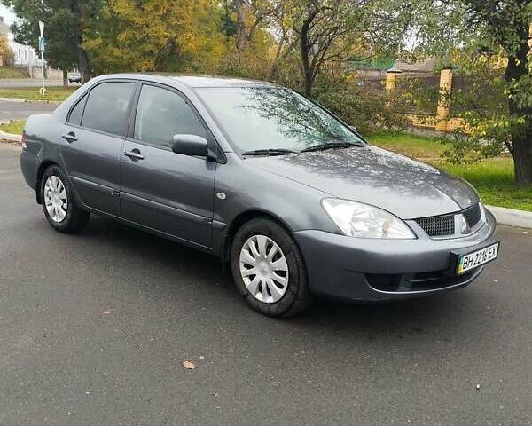 Серый Мицубиси Лансер, объемом двигателя 1.6 л и пробегом 181 тыс. км за 4500 $, фото 1 на Automoto.ua