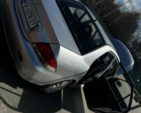 Серый Мицубиси Лансер, объемом двигателя 1.58 л и пробегом 261 тыс. км за 4500 $, фото 8 на Automoto.ua