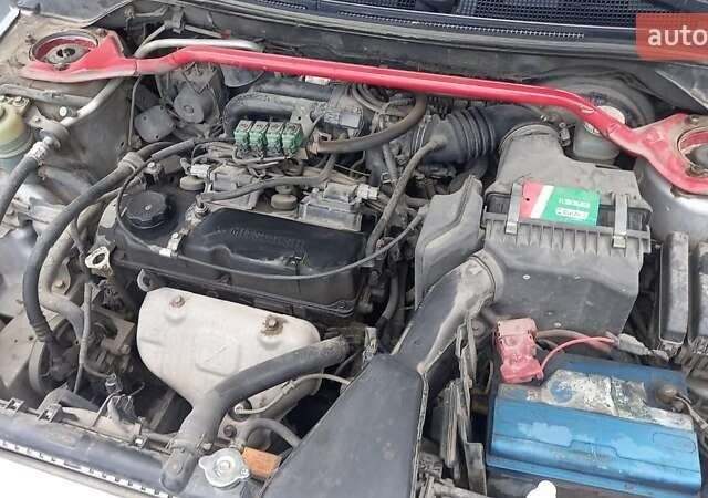 Сірий Міцубісі Lancer, об'ємом двигуна 1.6 л та пробігом 298 тис. км за 4100 $, фото 23 на Automoto.ua