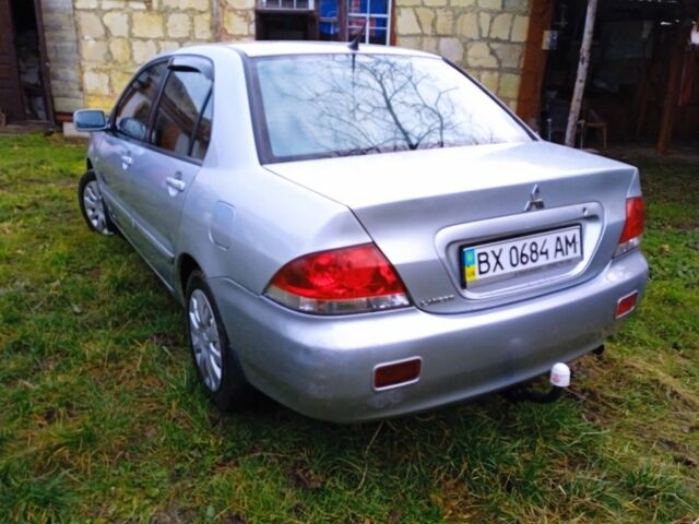 Сірий Міцубісі Lancer, об'ємом двигуна 1 л та пробігом 400 тис. км за 2850 $, фото 4 на Automoto.ua